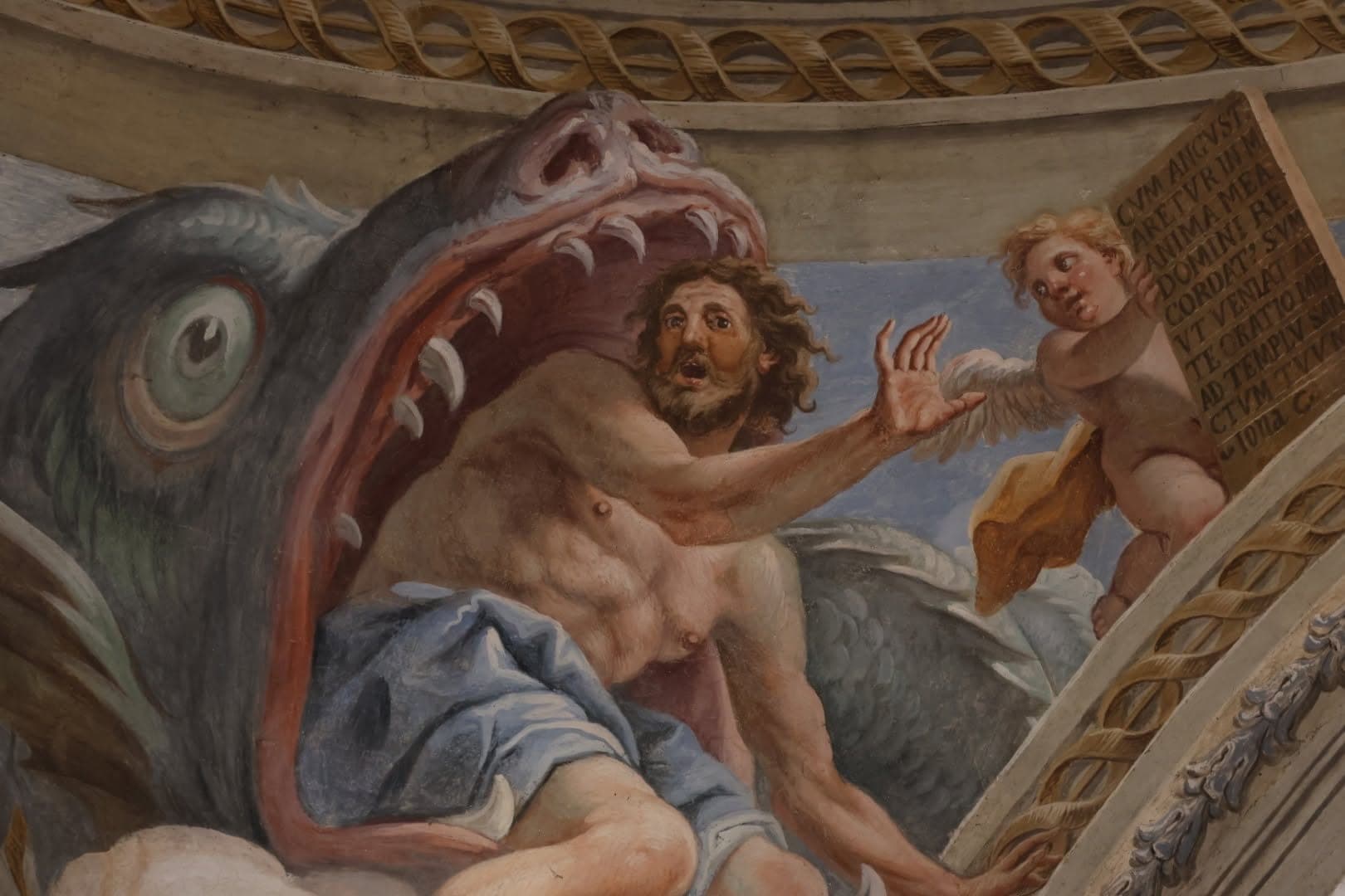 Giona che esce dalla bocca del grande pesce